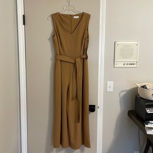 Tan Calvin Klein jumpsuit size 12. New, never worn